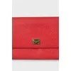 Red leather clutch