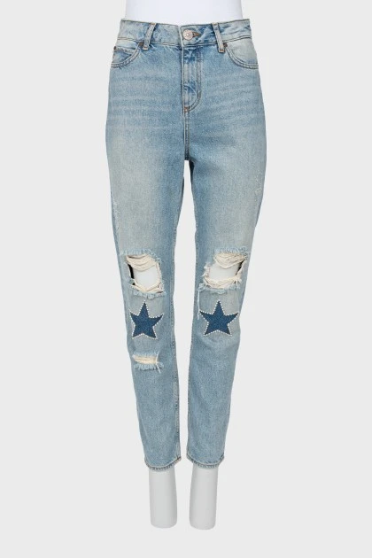 Ripped effect embellished jeans