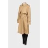 Brown trench coat at the waist