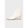 White mid heel boots