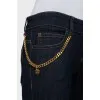 Flared jeans decorated with chain
