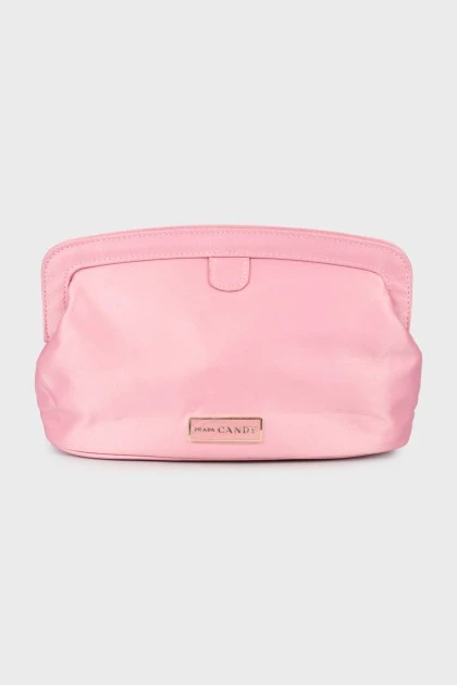 Pink cosmetic bag with brand logo