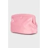 Pink cosmetic bag with brand logo