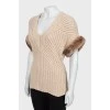 Cashmere sweater with fur sleeves