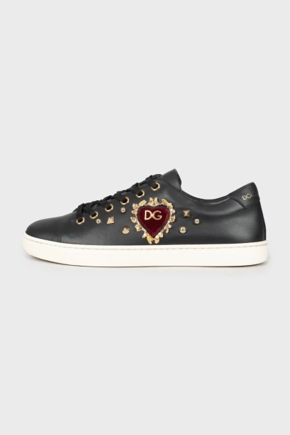 Black leather sneakers with decor