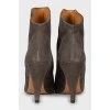 Suede ankle boots with asymmetrical upper