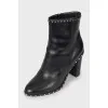 Leather ankle boots decorated with rhinestones
