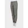 Gray trousers with cuffs