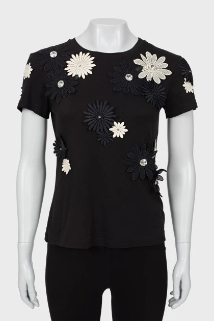 Black T-shirt decorated with flowers