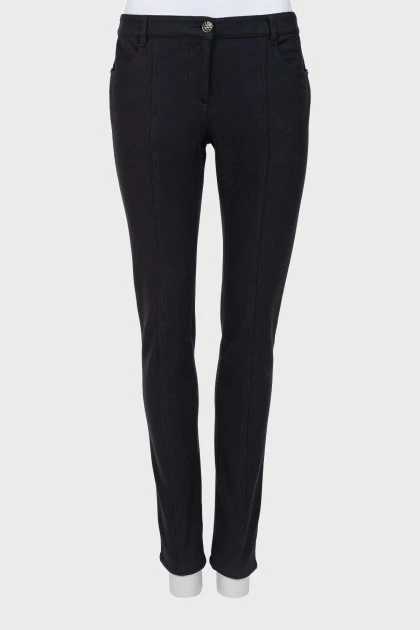 Black trousers with stitched creases