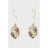 Gold-tone drop earrings with a pattern
