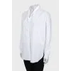 White shirt with knitted sleeves