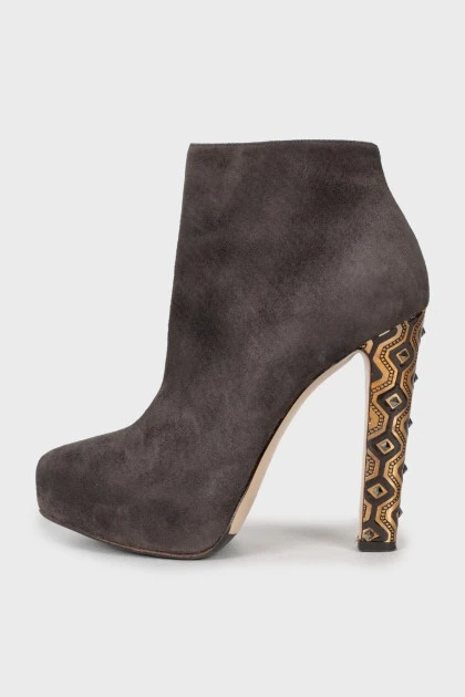 Suede ankle boots with embellished heel