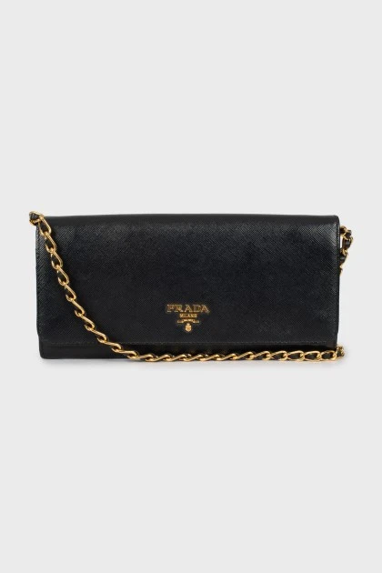 Leather clutch with brand logo
