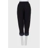 Knitted trousers with elastic