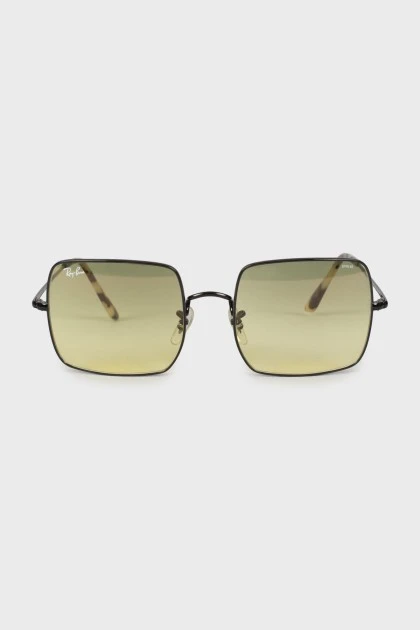 Square sunglasses with green lenses