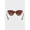 Sunglasses with red frames