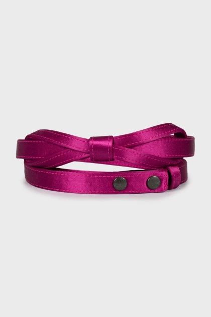 Textile belt with bow