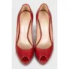 Red shoes with embossed leather