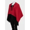 Wool poncho with fringes