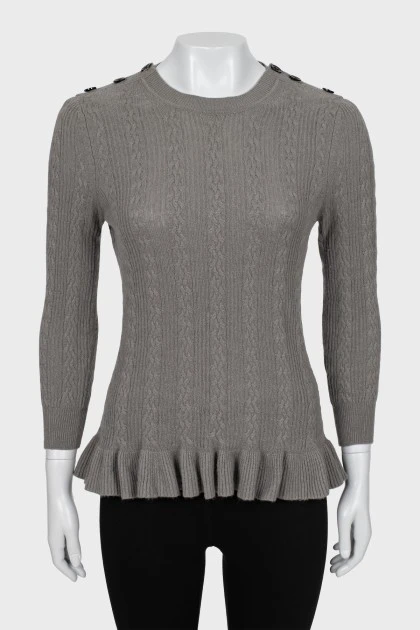 Knitted jumper with ruffled bottom