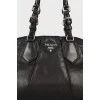 Leather bag with silver logo