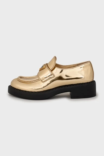 Gold leather loafers