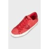 Red leather sneakers