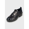 Embossed leather oxfords