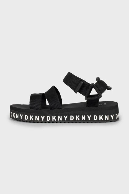 Black sandals with brand logo