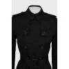 Black trench coat with pleated hem