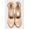 Beige leather shoes with embossing
