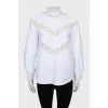 White blouse decorated with lace