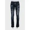 Men's blue jeans with distressed effect