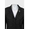 Jacket in small print with brooch
