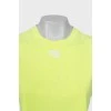Light green top with brand logo