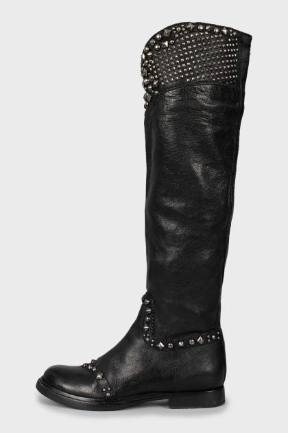 Leather boots decorated with spikes