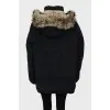 Black down jacket with fur on the hood