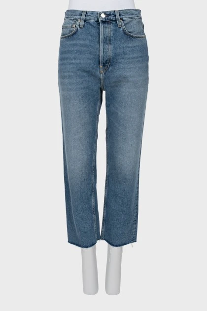 Button-down jeans with raw hem