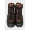 Men's leather boots with embossed logo
