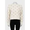 Cashmere sweater decorated with flowers
