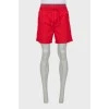 Men's red shorts with tag