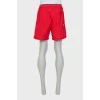 Men's red shorts with tag