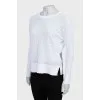 White pullover with perforations