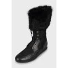 Boots in signature print with fur
