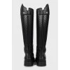 Black boots with embossed leather