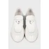 White leather loafers