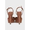 Suede sandals with tag