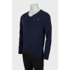 Men's blue V-neck jumper