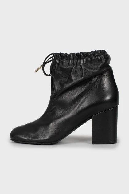 Leather ankle boots with tags